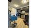 Well-equipped kitchen featuring stainless steel appliances and a cozy dining nook at 5894 Par Three Ct, Lithonia, GA 30038