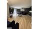 Bright and airy living room with sleek flooring and modern furnishings at 5894 Par Three Ct, Lithonia, GA 30038