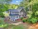 Expansive backyard featuring a spacious deck perfect for outdoor entertaining and relaxation at 4250 Edgewater Nw Ct, Kennesaw, GA 30144