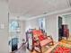 Elegant foyer with staircase, decorative lighting, and a glimpse of the Primary bedroom at 4250 Edgewater Nw Ct, Kennesaw, GA 30144
