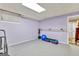 Home gym featuring equipment, mirrors, and rubber flooring at 4250 Edgewater Nw Ct, Kennesaw, GA 30144