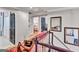 Hallway with hardwood floors, a sitting area, and access to bedrooms at 4250 Edgewater Nw Ct, Kennesaw, GA 30144