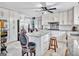 Bright kitchen with granite countertops, stainless steel appliances, and an island with barstool seating at 4250 Edgewater Nw Ct, Kennesaw, GA 30144
