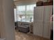 Closet area with white built-ins, window, and ottoman at 101 Elkins Blvd, Locust Grove, GA 30248