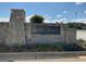 Nine Oaks neighborhood entrance with stone monument and well-maintained landscaping at 101 Elkins Blvd, Locust Grove, GA 30248