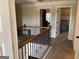 Upstairs hallway with access to the study and bedroom at 101 Elkins Blvd, Locust Grove, GA 30248
