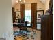 Office area boasting a floral rug, unique decor, and a large window at 101 Elkins Blvd, Locust Grove, GA 30248