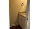 Powder room featuring a single vanity with granite countertop, modern faucet, and white cabinets at 101 Elkins Blvd, Locust Grove, GA 30248