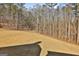 Expansive backyard with a gentle slope, providing ample space for outdoor activities and entertainment at 135 Wet Wood Dr # 12, Fairburn, GA 30213