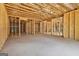 Spacious unfinished basement with exposed wood framing, providing a great opportunity for customization at 135 Wet Wood Dr # 12, Fairburn, GA 30213