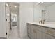 Stylish bathroom with gray cabinetry, quartz counters, and modern gold hardware throughout at 135 Wet Wood Dr # 12, Fairburn, GA 30213