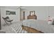 Comfortable bedroom with ample space, featuring a baseball theme, soft carpet, and a comfortable sitting area at 135 Wet Wood Dr # 12, Fairburn, GA 30213