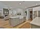 Bright kitchen featuring a center island, stainless steel appliances, and ample cabinet space at 135 Wet Wood Dr # 12, Fairburn, GA 30213