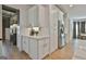Stylish kitchen boasting stainless steel appliances and ample cabinet space at 135 Wet Wood Dr # 12, Fairburn, GA 30213