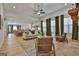 Spacious living room with fireplace and seamless flow to kitchen and dining at 135 Wet Wood Dr # 12, Fairburn, GA 30213