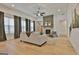Bright living room featuring hardwood floors and stone fireplace at 135 Wet Wood Dr # 12, Fairburn, GA 30213