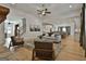 Inviting living room with hardwood floors, natural light, and access to the kitchen at 135 Wet Wood Dr # 12, Fairburn, GA 30213