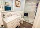 Bathroom with vanity, modern sink, and a glass enclosed tile shower at 3777 Edward Rd, Rex, GA 30273