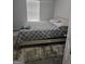 Bedroom features carpet, a queen-sized bed, and bright natural light from window at 1871 Sandy Trail Dr, Hampton, GA 30228