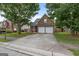 Brick home with a well-maintained front yard and driveway at 1871 Sandy Trail Dr, Hampton, GA 30228