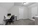 Office area with carpet, a desk, and a computer at 1871 Sandy Trail Dr, Hampton, GA 30228