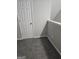 Corner of a room with gray carpet and white trim with a white door at 1871 Sandy Trail Dr, Hampton, GA 30228