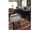 Functional home office space with a desk, comfortable seating, and ample storage at 1254 Ne Woodland Rd, Conyers, GA 30012
