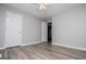 Bedroom featuring neutral paint, carpet flooring, and white doors at 133 Deerfield Ln, Carrollton, GA 30116