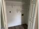 A practical closet equipped with shelving and electrical outlets at 133 Deerfield Ln, Carrollton, GA 30116