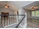 Open living area featuring a brick fireplace and vaulted ceilings at 133 Deerfield Ln, Carrollton, GA 30116