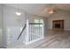 Spacious living room with fireplace and views of the front entry at 133 Deerfield Ln, Carrollton, GA 30116