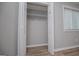 Walk-in closet with shelving, providing ample storage space for clothes and accessories at 325 Berry Ct, Villa Rica, GA 30180
