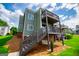 Multi-level back decks with stairs offer exceptional outdoor living at 325 Berry Ct, Villa Rica, GA 30180