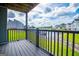 Enjoy the breathtaking lake view from the covered patio, perfect for entertaining and relaxation at 325 Berry Ct, Villa Rica, GA 30180