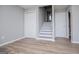 A living room area boasts access to an upstairs, a closet, and an open entry to the bathroom at 325 Berry Ct, Villa Rica, GA 30180