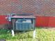 Outdoor air conditioning unit is protected by a metal cage at 5243 Eubanks Dr, Lake City, GA 30260