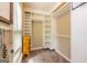 Walk-in closet with built-in shelving and ample storage for an organized wardrobe at 10 Queens Ct, Sharpsburg, GA 30277