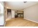 The home's bright, open floorplan features new floors, neutral walls, and a staircase at 10 Queens Ct, Sharpsburg, GA 30277