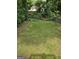 Spacious backyard with a manicured lawn and fenced perimeter at 937 Sw Metropolitan Sw Pkwy, Atlanta, GA 30310