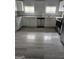 Open concept kitchen with stainless steel appliances, modern cabinets, and hardwood floors at 937 Sw Metropolitan Sw Pkwy, Atlanta, GA 30310