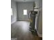 Utility room with wood floors and a hot water heater at 937 Sw Metropolitan Sw Pkwy, Atlanta, GA 30310