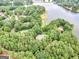 An aerial view of the property showing its proximity to the lake at 230 Shorewood Ct, Mcdonough, GA 30252