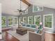 Sun-filled living room with vaulted ceilings, lots of natural light, and comfortable seating at 230 Shorewood Ct, Mcdonough, GA 30252