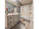 Cozy bathroom with vanity, mirror, shower/tub combination, and neutral flooring at 190 Princeton Way, Covington, GA 30016