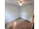 Bedroom featuring hardwood floors, white walls, and overhead ceiling fan at 190 Princeton Way, Covington, GA 30016