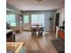 Eat-in kitchen area featuring tile floors, natural light, and traditional wooden furniture at 190 Princeton Way, Covington, GA 30016