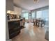 Eat-in kitchen area featuring tile floors, natural light, and direct access to the backyard at 190 Princeton Way, Covington, GA 30016