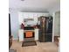 Well-equipped kitchen with stainless steel appliances and ample cabinet space, adjacent to dining area at 190 Princeton Way, Covington, GA 30016