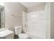 Clean bathroom with a combined shower and bathtub and a white vanity at 115 Fairview Way, Stockbridge, GA 30281