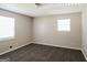 Bedroom with plush carpeting, a window providing natural light and ventilation at 115 Fairview Way, Stockbridge, GA 30281